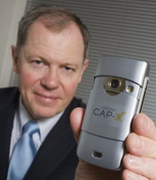 CAP-XX CEO with a supercapacitor in a camera