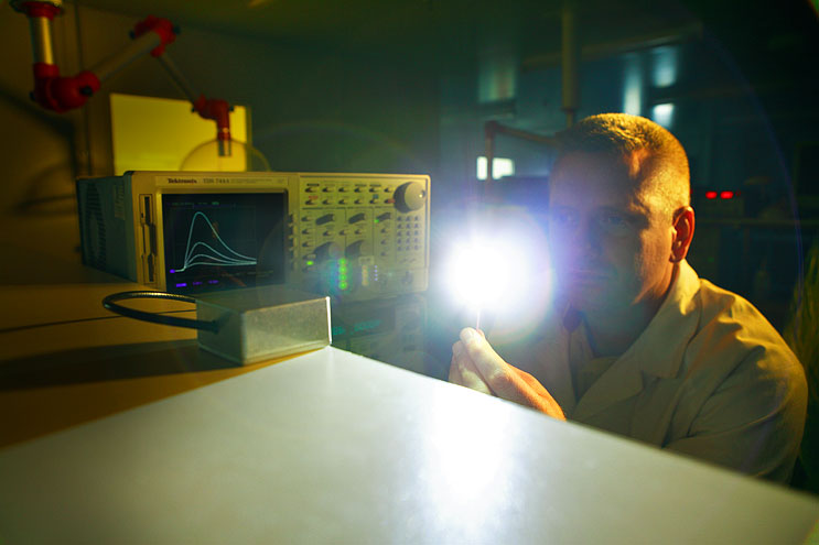 CAP-XX's Dr. Trevor Smith sets up light measurement equipment